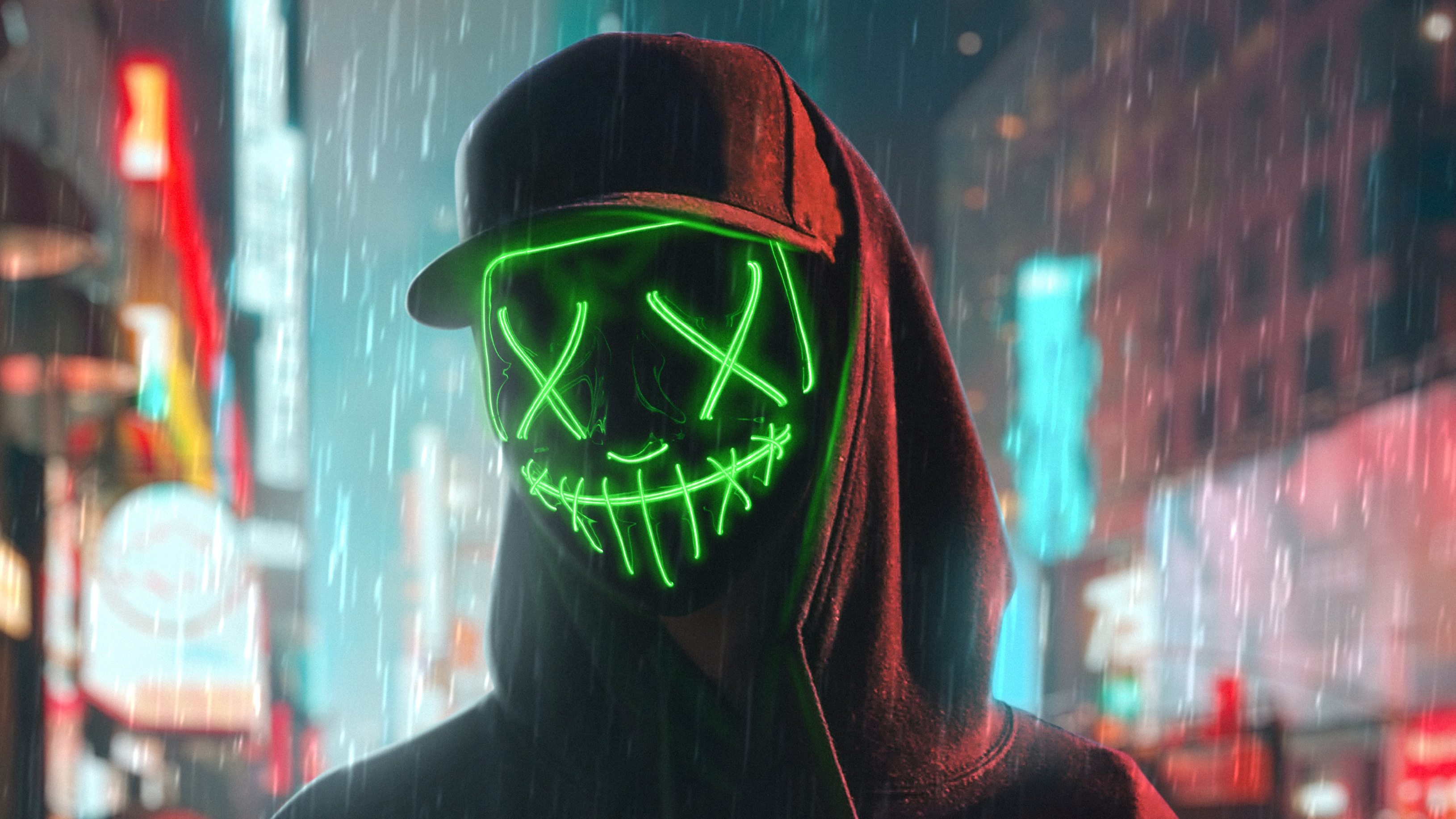Person wearing a green neon mask and hoodie in the rain HD Wallpaper
