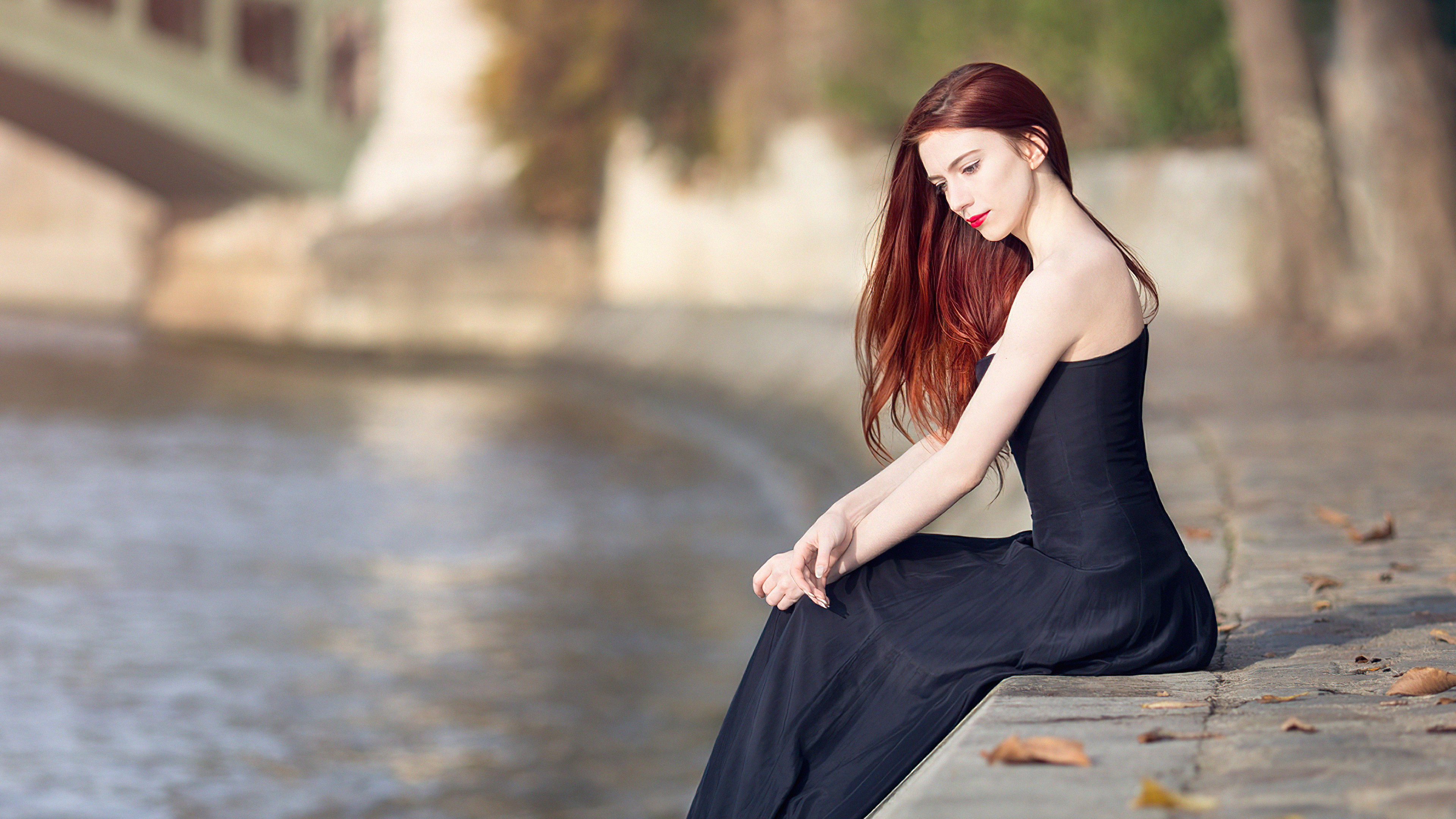 Woman in black dress by the water HD Wallpaper