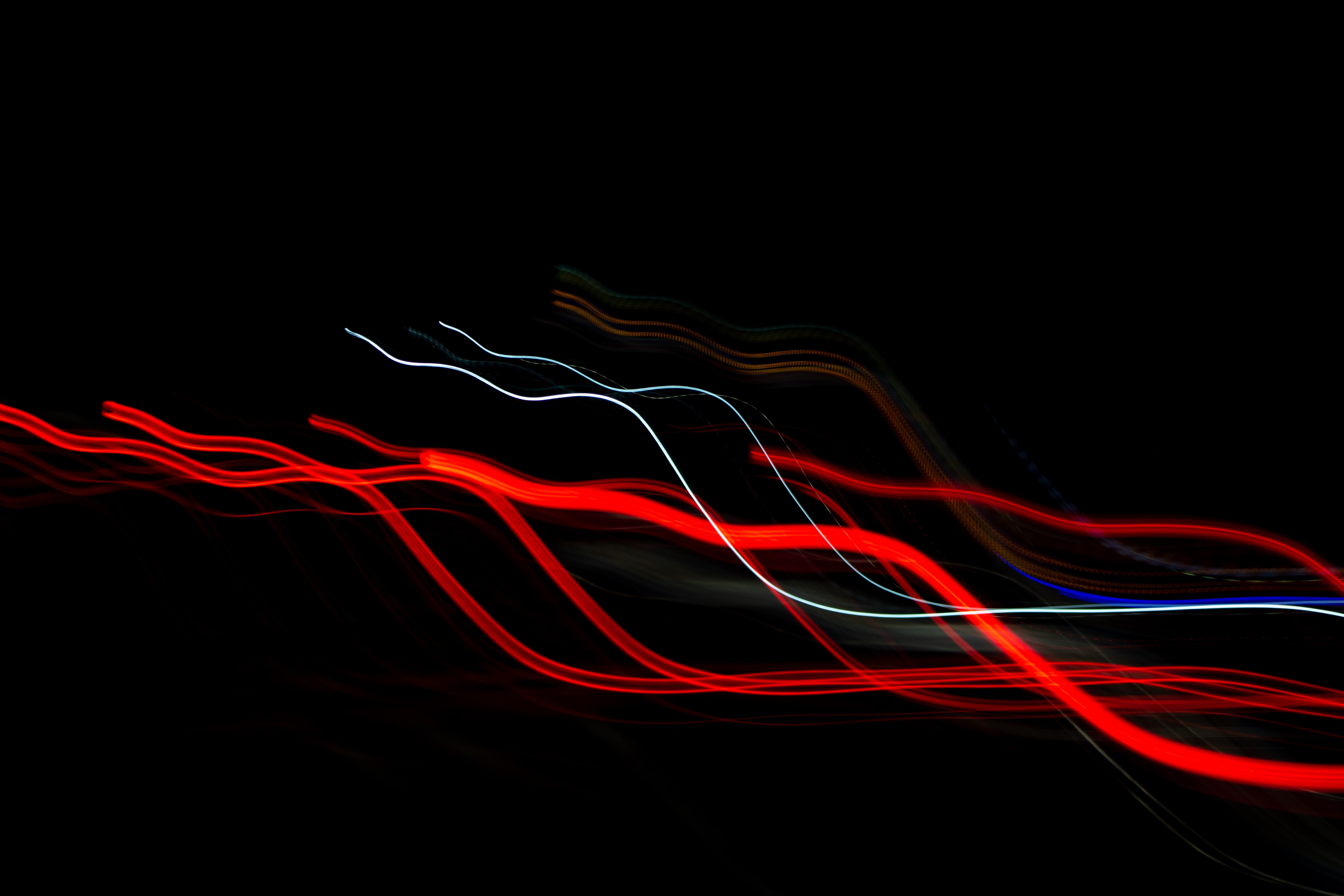 Abstract light trails on black background HD Wallpaper