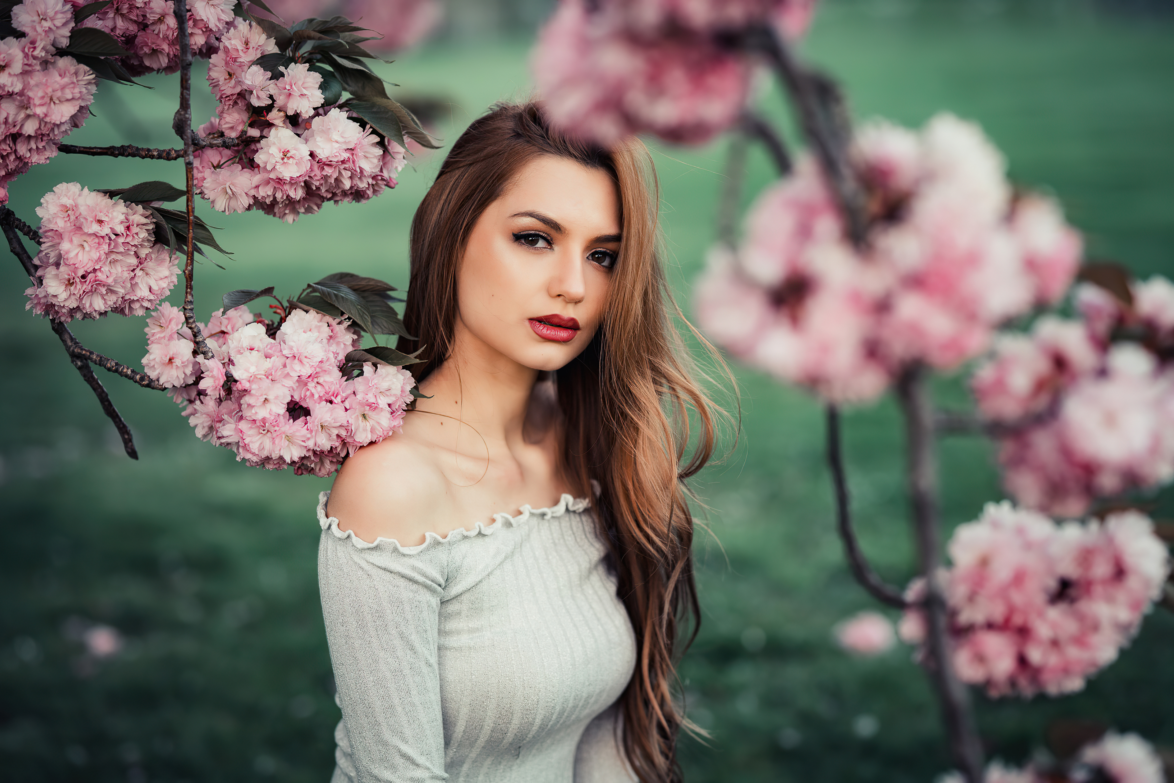 Blonde Model Posing with Pink Blossoms in HD Wallpaper