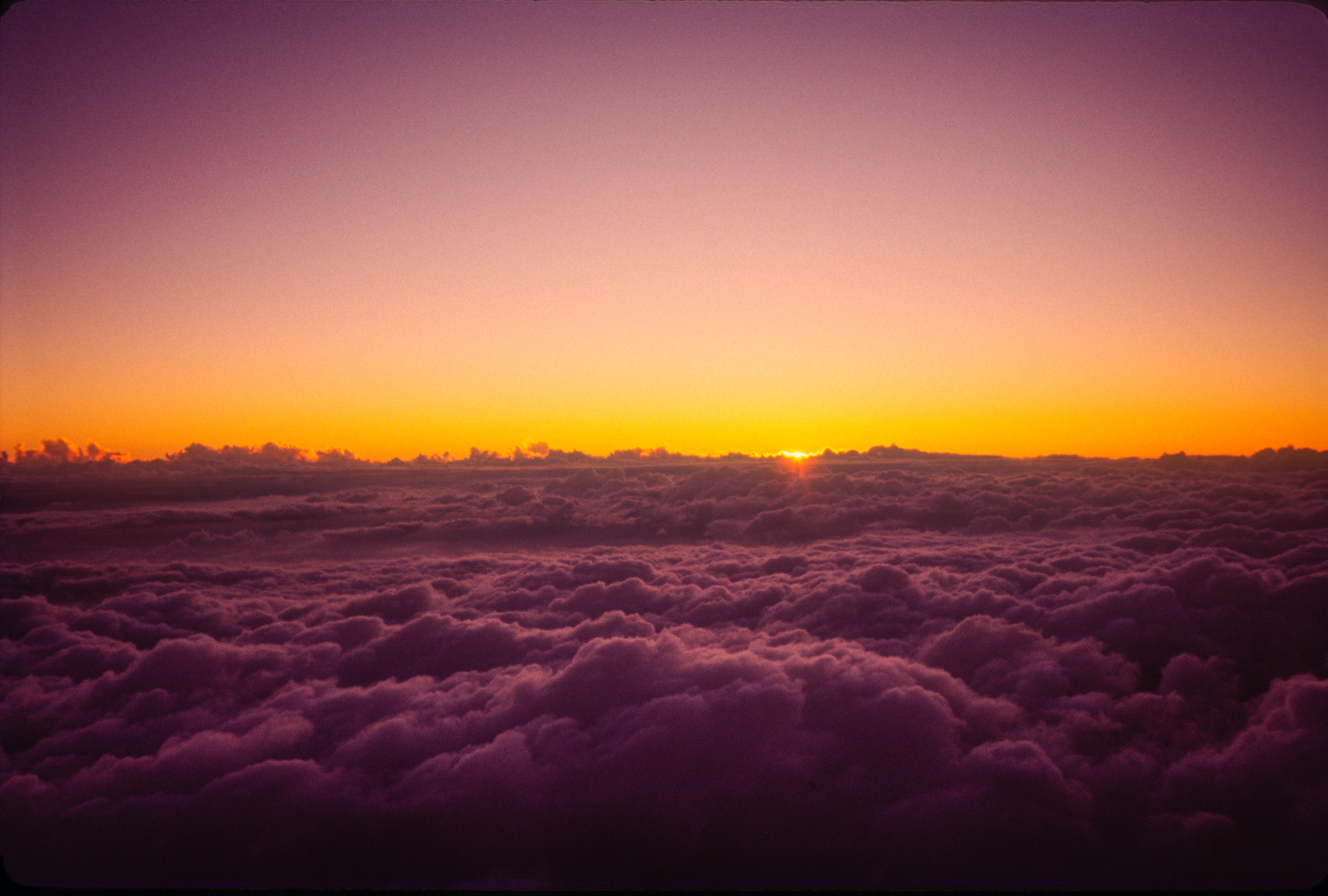 Sunset over clouds from airplane HD Wallpaper