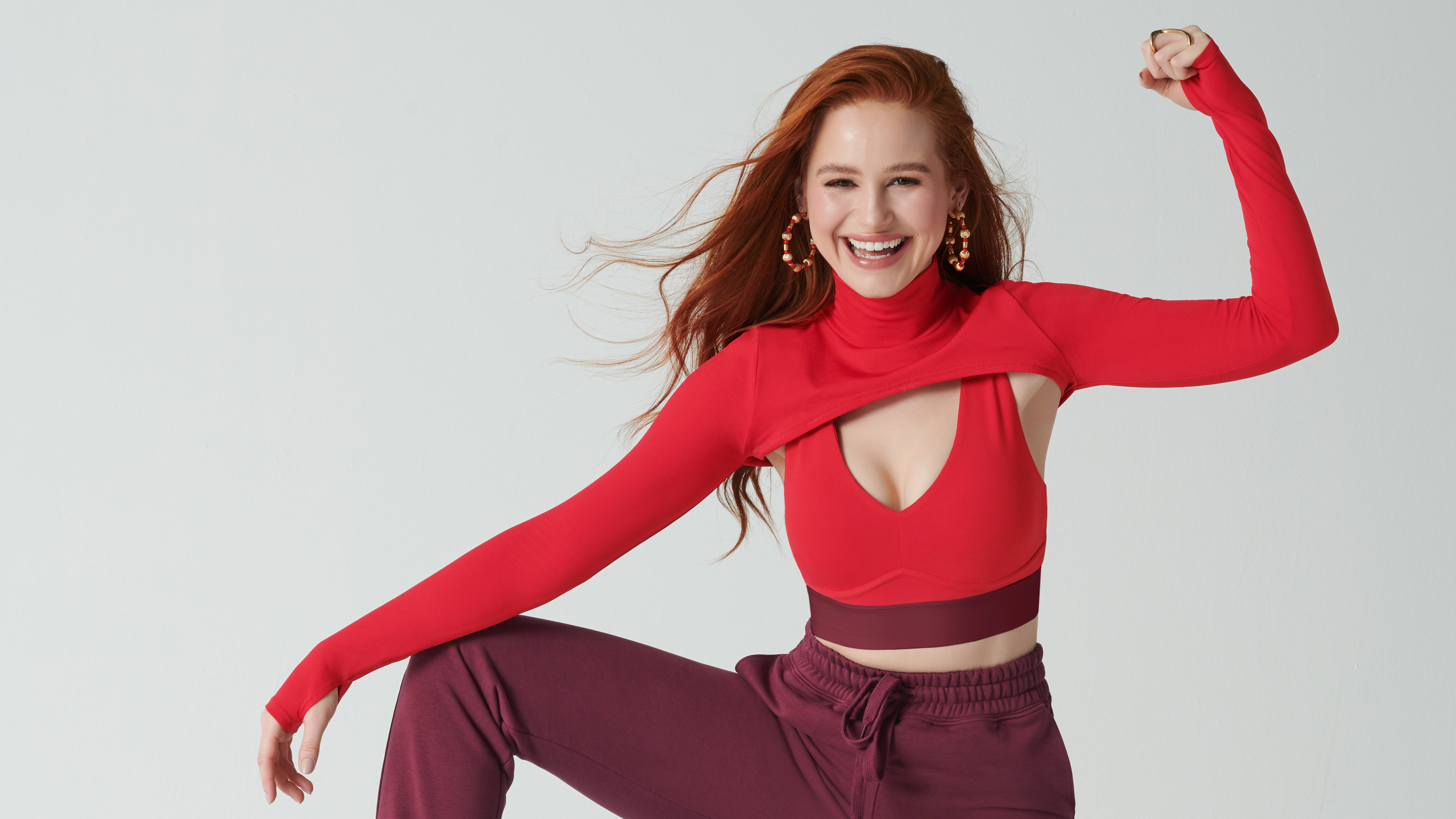 Madelaine Petsch in red athletic wear HD Wallpaper