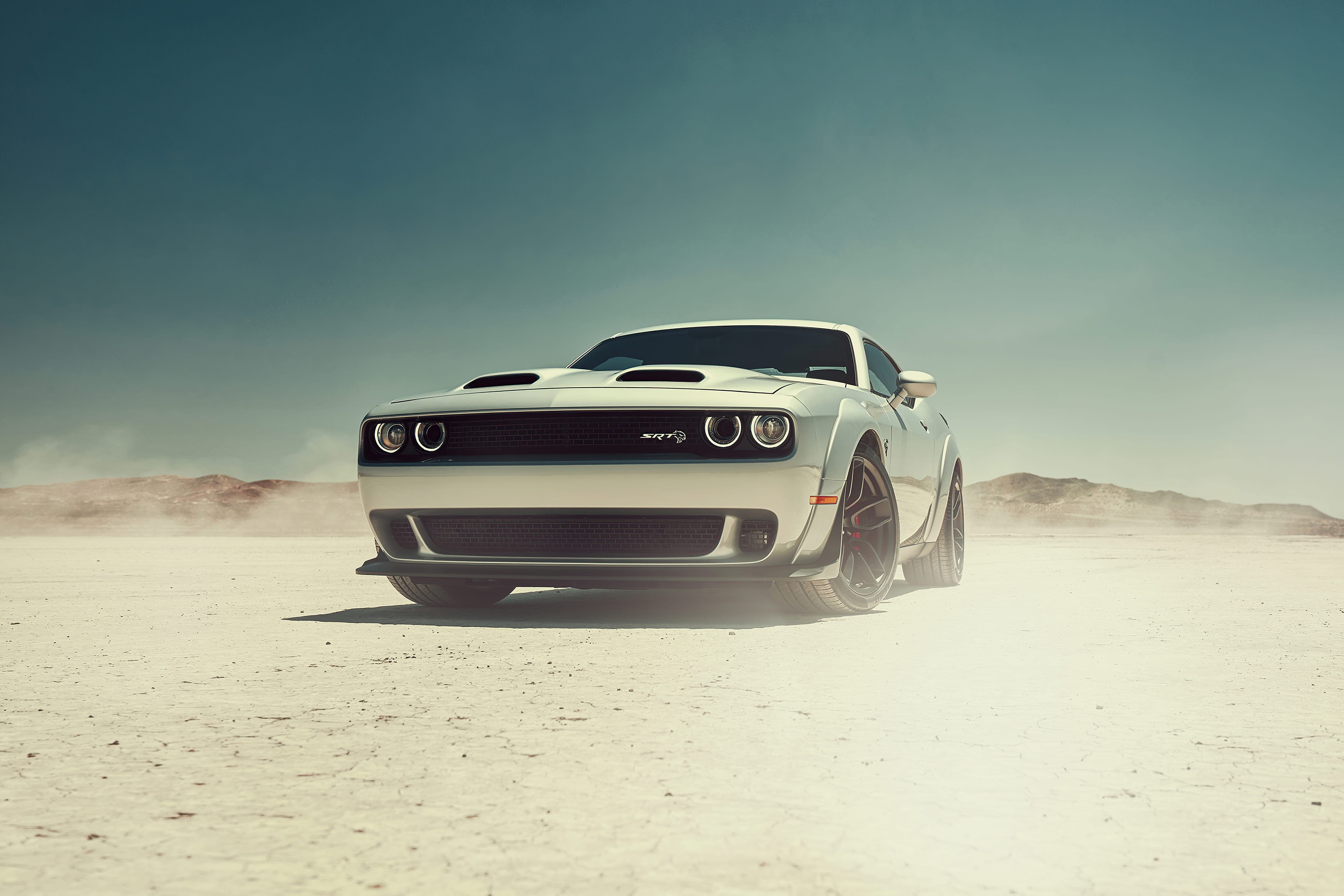 Dodge Challenger SRT Hellcat in a desert landscape HD Wallpaper
