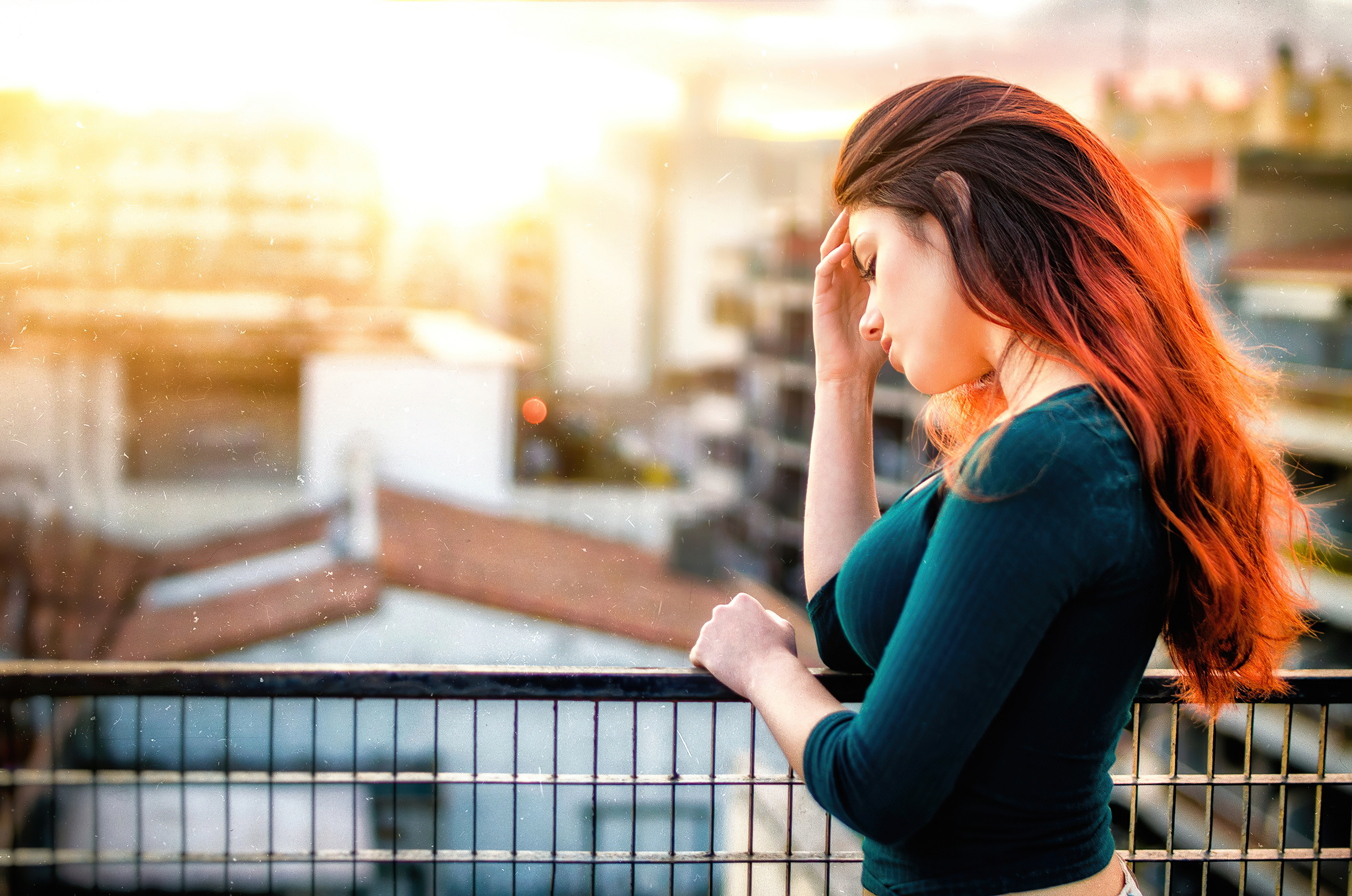 Girl with red hair on a balcony HD Wallpaper