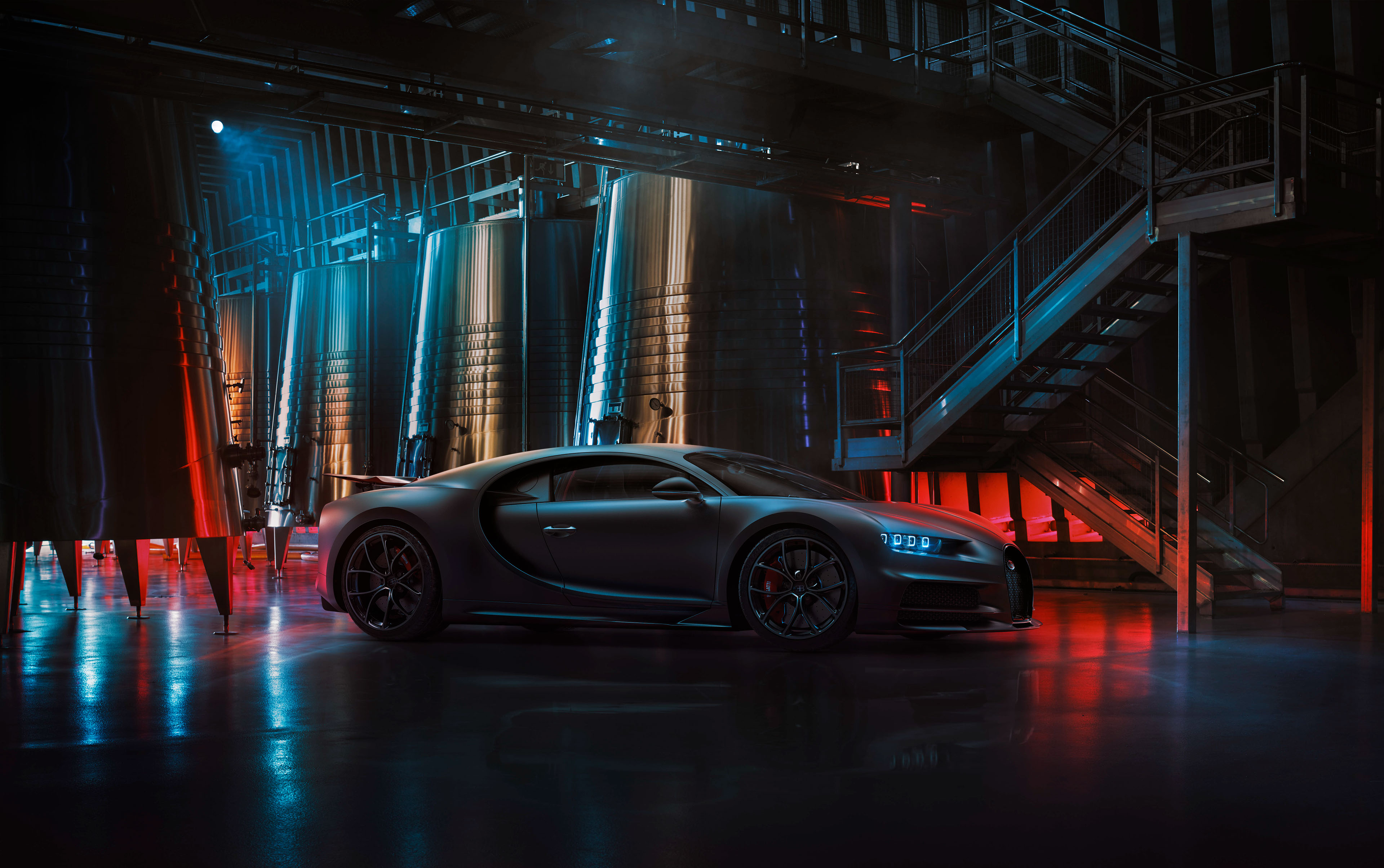 Bugatti Chiron in industrial setting with colorful lights HD Wallpaper