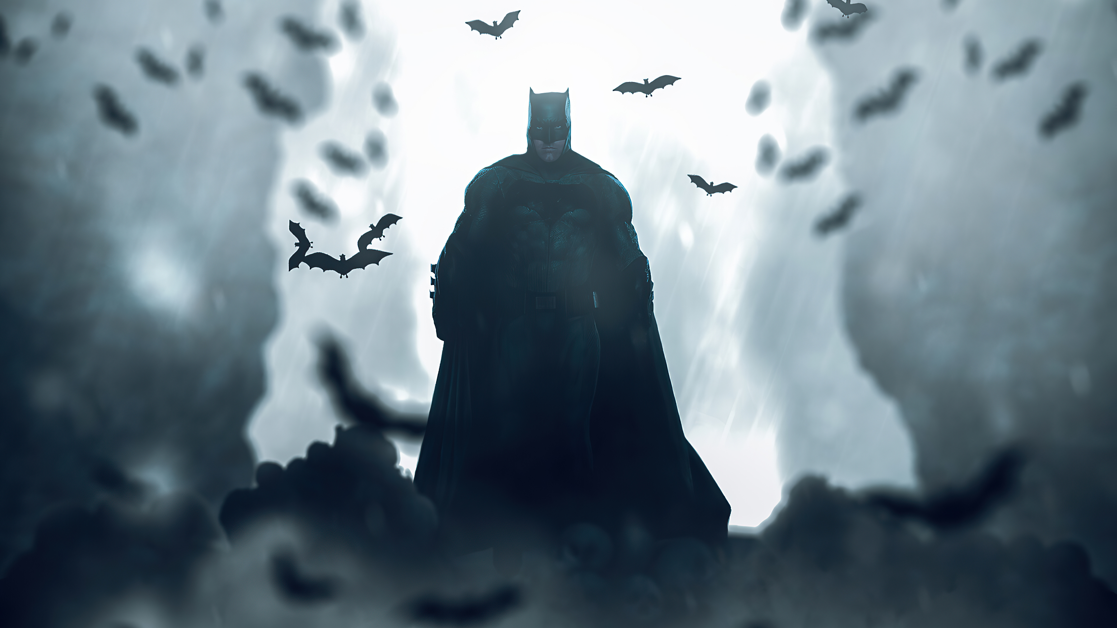 Batman surrounded by bats in a stormy sky HD Wallpaper