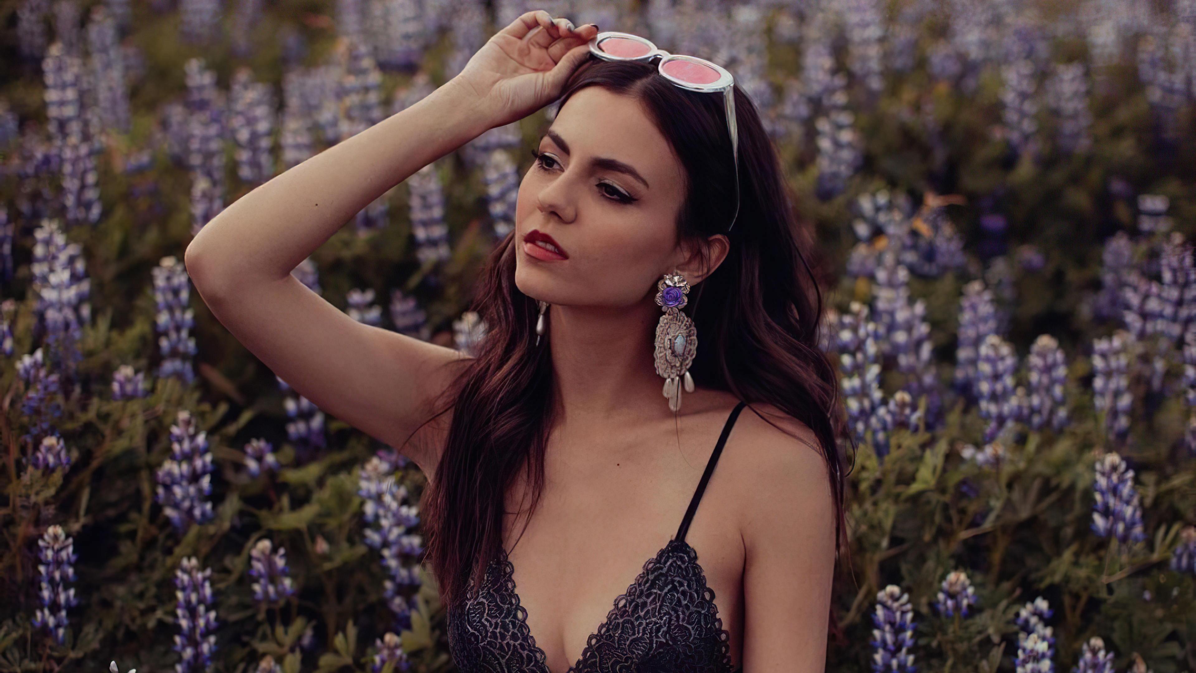 Victoria Justice in a field of purple flowers HD Wallpaper