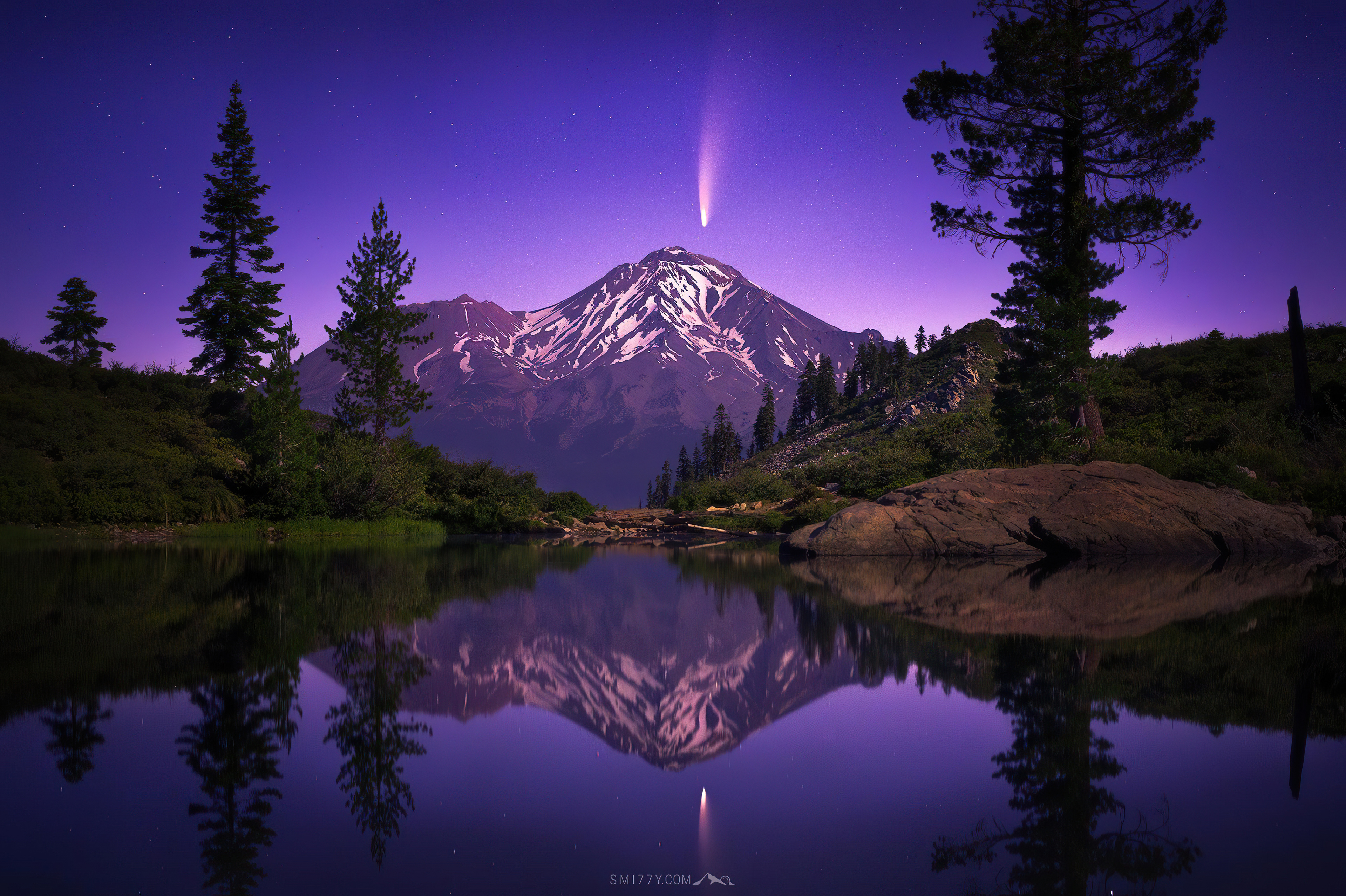 Comet over snow-capped mountains reflected in lake HD Wallpaper
