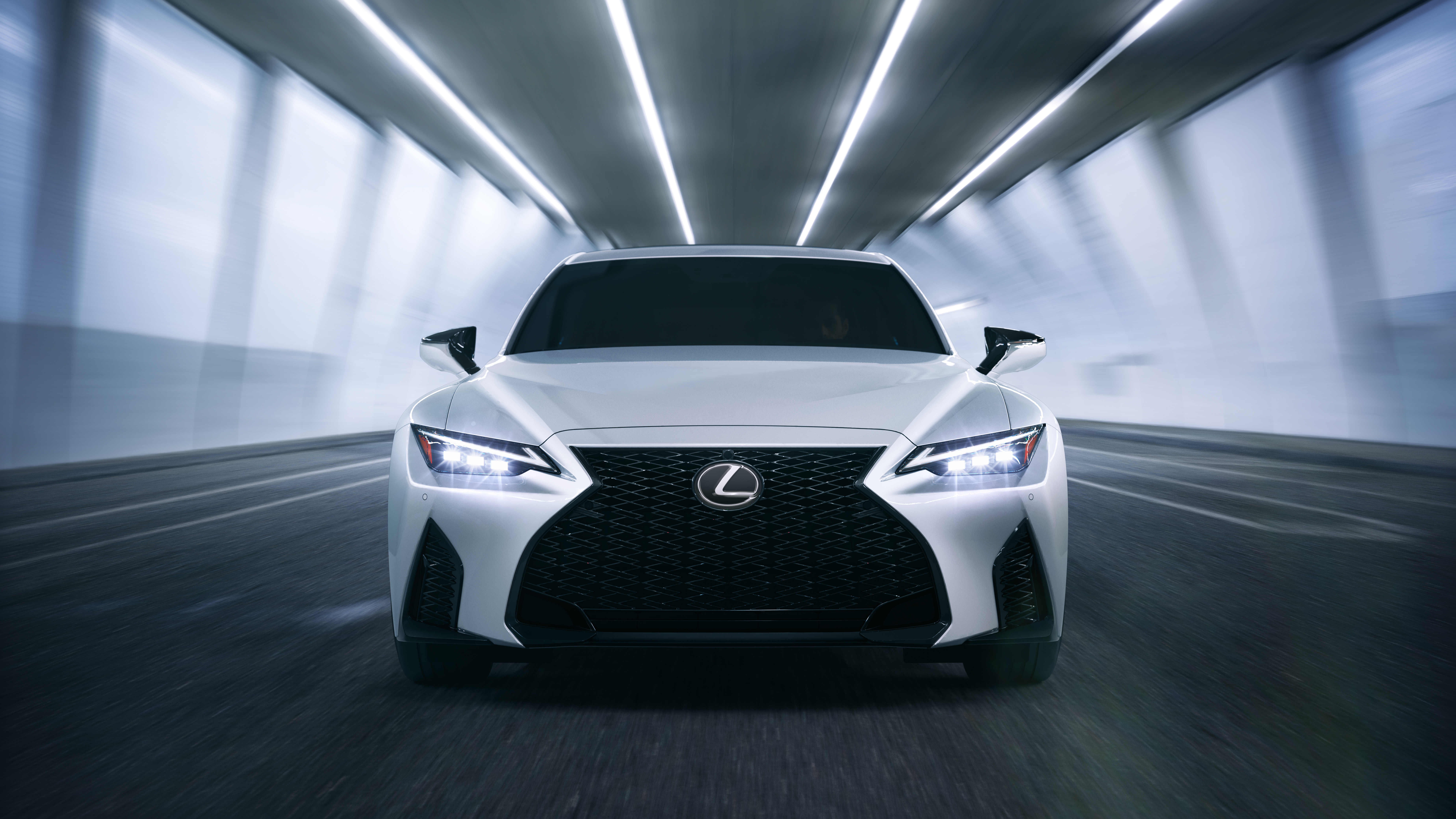 White Lexus IS driving through a tunnel HD Wallpaper