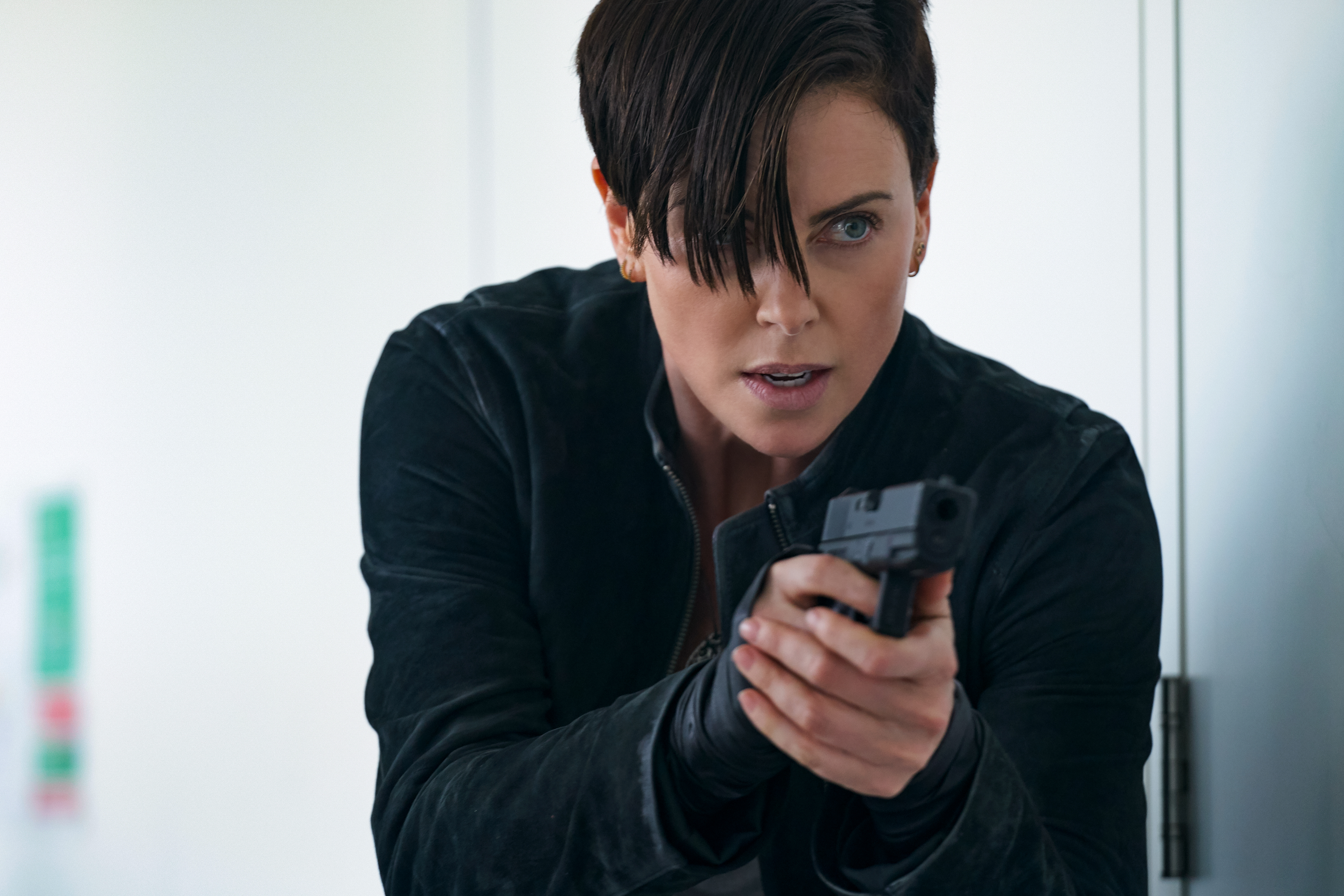 Andy from The Old Guard holding a gun HD Wallpaper