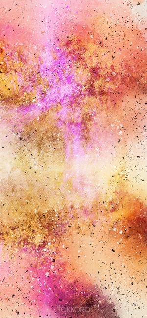 Abstract watercolor wash with pink, gold, and black speckles