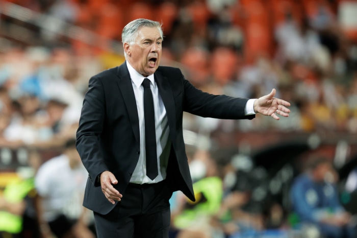 Carlo Ancelotti in suit