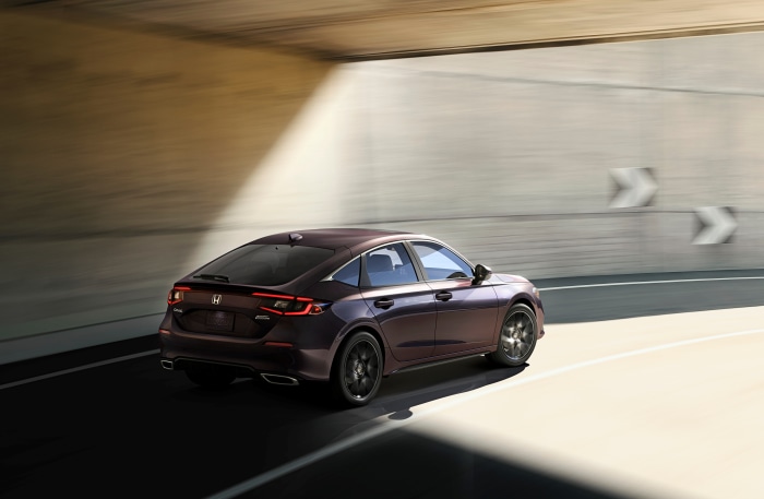 2022 Honda Civic Hatchback Sport Touring driving through tunnel