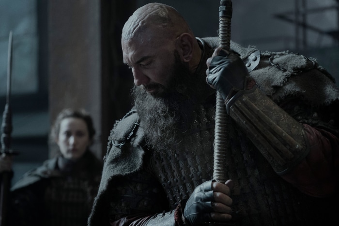 Dave Bautista in Armor Holding a Staff