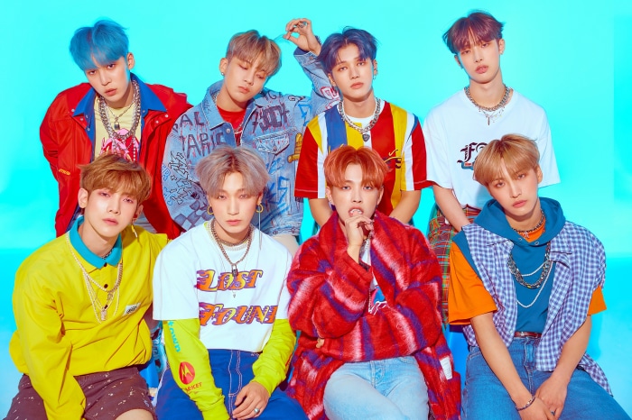 ATEEZ group photo with colorful outfits