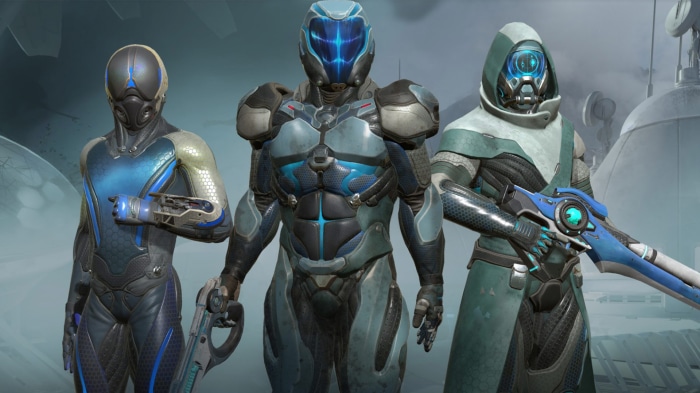 Three futuristic soldiers with advanced armor and weapons