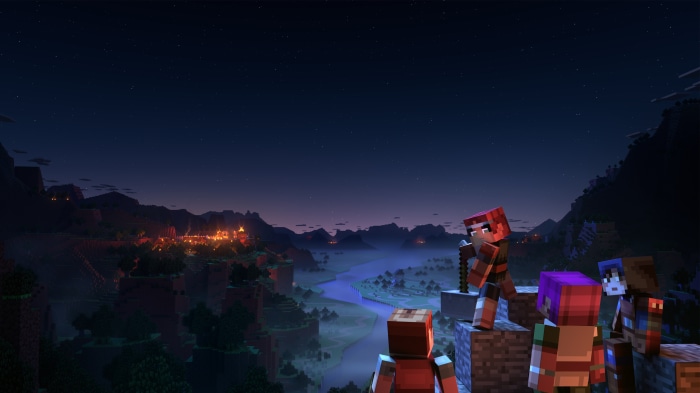 Minecraft Dungeons characters overlooking a valley at night