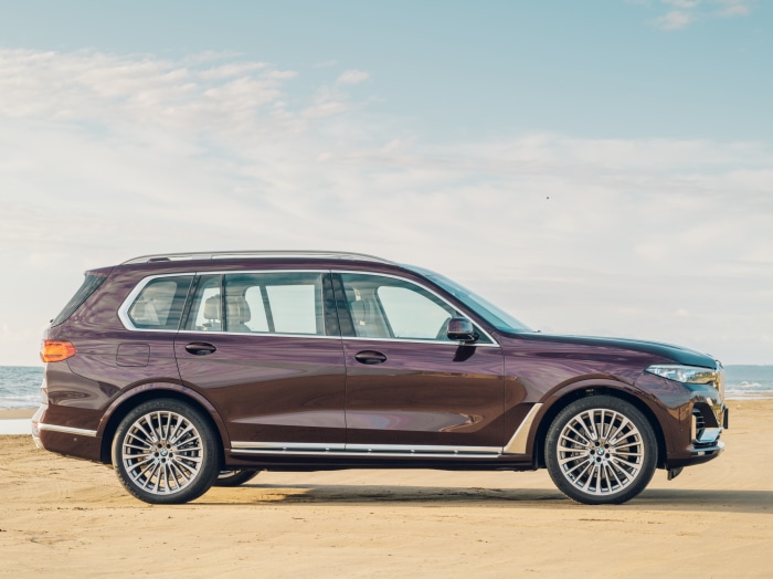 BMW X7 xDrive40d SUV on a beach