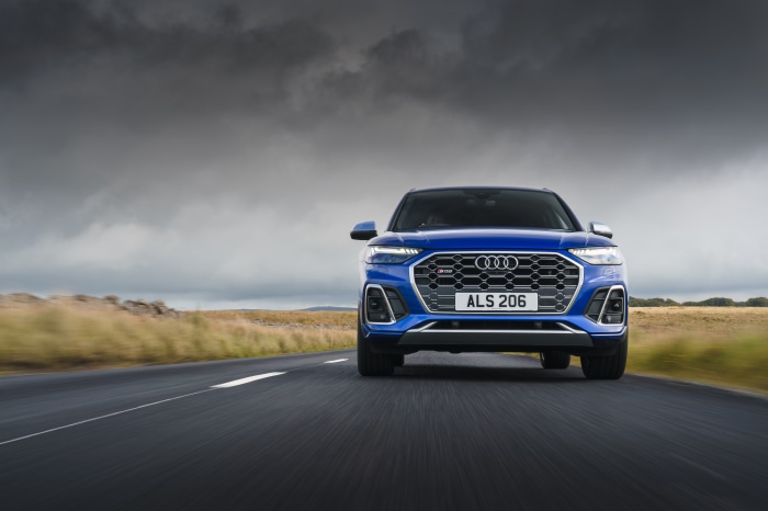 Blue Audi SQ5 TDI 4K driving on a road