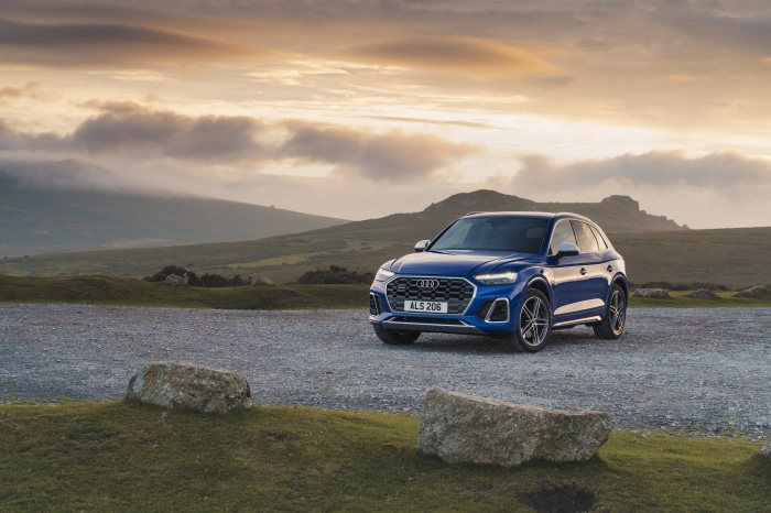 Blue Audi SQ5 TDI 4K SUV on gravel road
