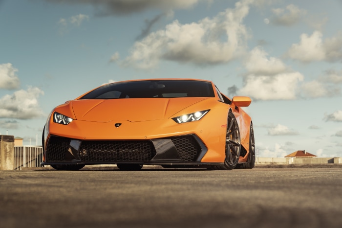 Orange Lamborghini Huracan on a rooftop