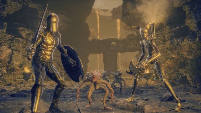 Golden warriors and creatures in a rocky cavern