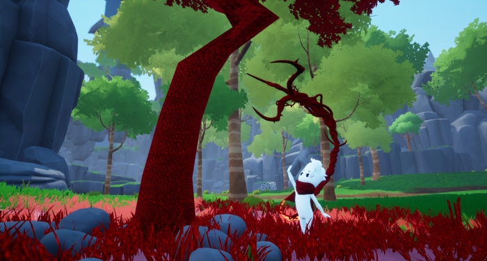 White creature with red scarf in forest