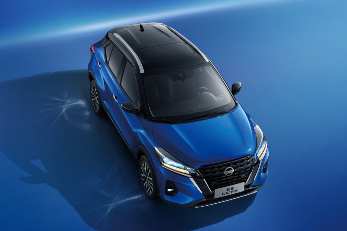 Blue Nissan Kicks SUV from above