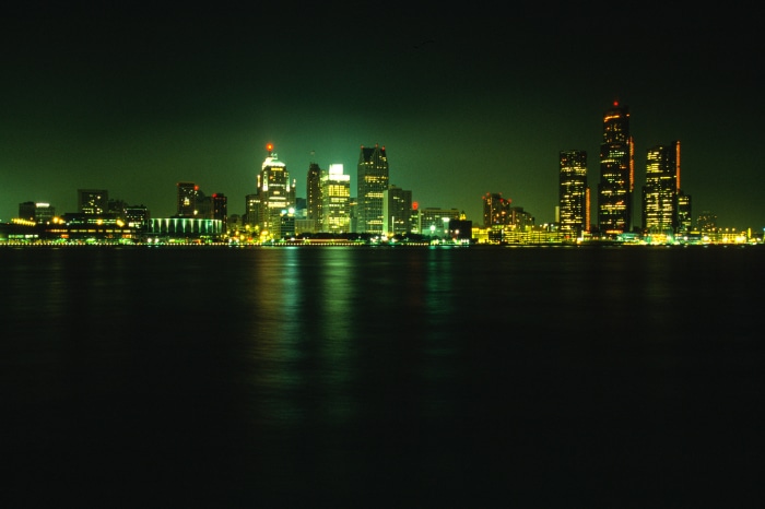 Detroit skyline at night across the river