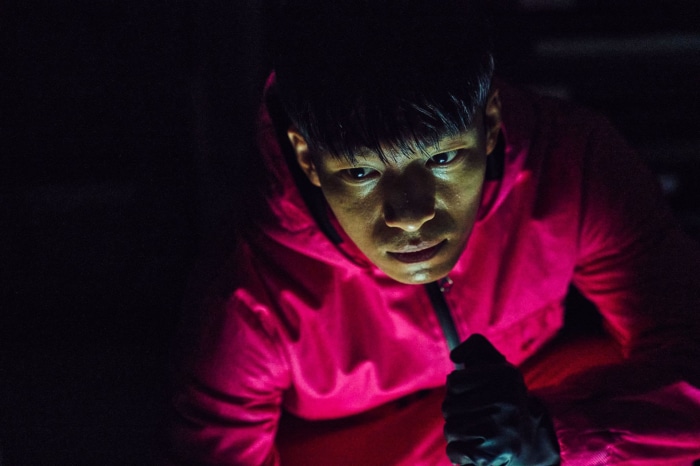 Man in pink tracksuit from Squid Game