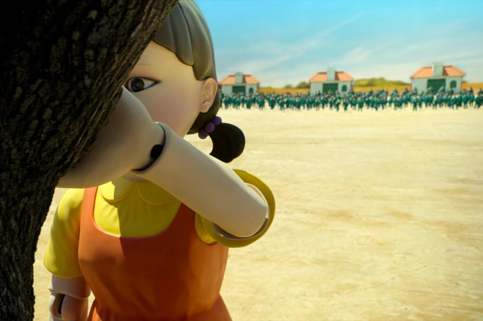 Giant doll from Squid Game in a field
