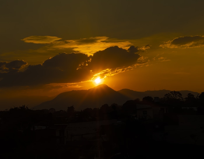 Sunset over mountains and town