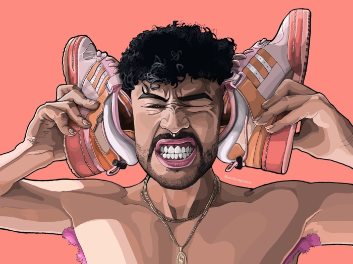 Bad Bunny holding shoes to his ears