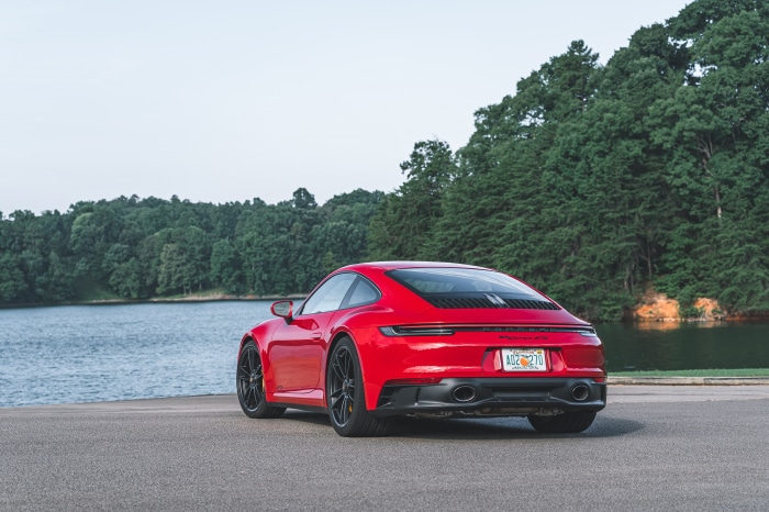Red Porsche 911 Carrera GTS 4K by a lake