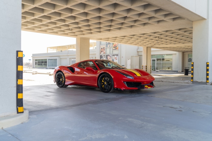 Red Ferrari 488 Pista Spider with Yellow Stripes
