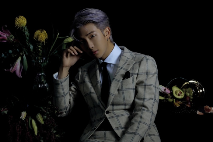 RM from BTS in a plaid suit