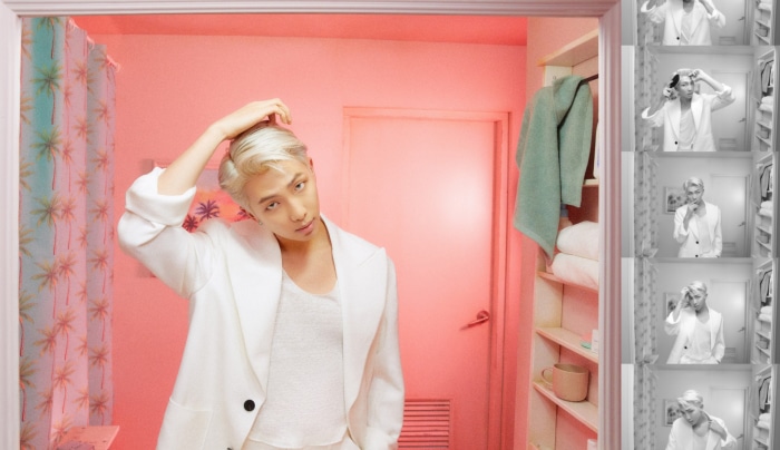 RM from BTS in a pink room