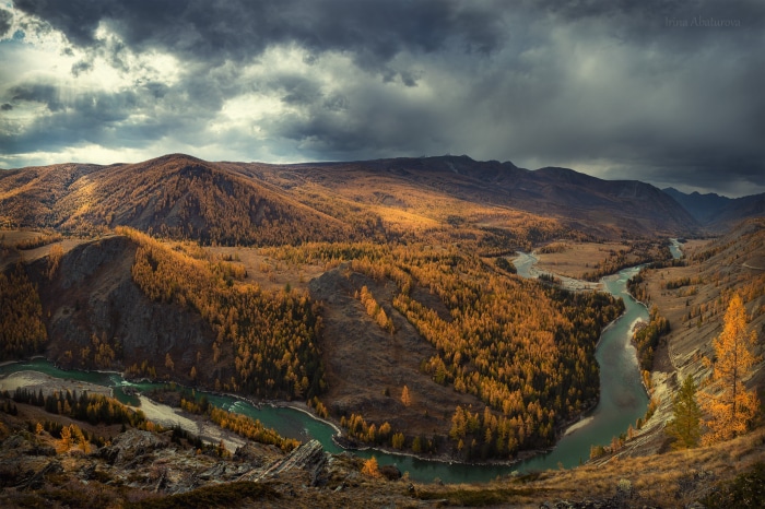 Autumn mountain valley with a winding river