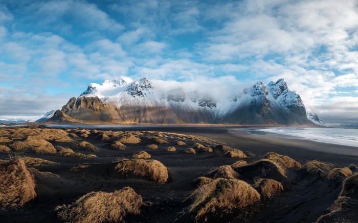 Vestrahorn mountain range on a black sand beach