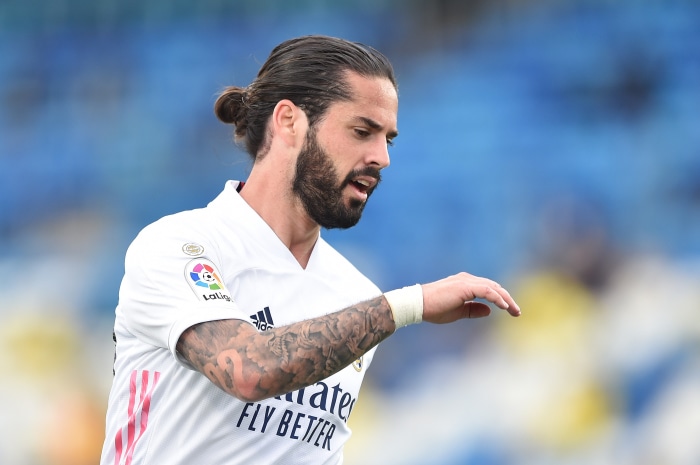 Isco Alarcón wearing Real Madrid jersey