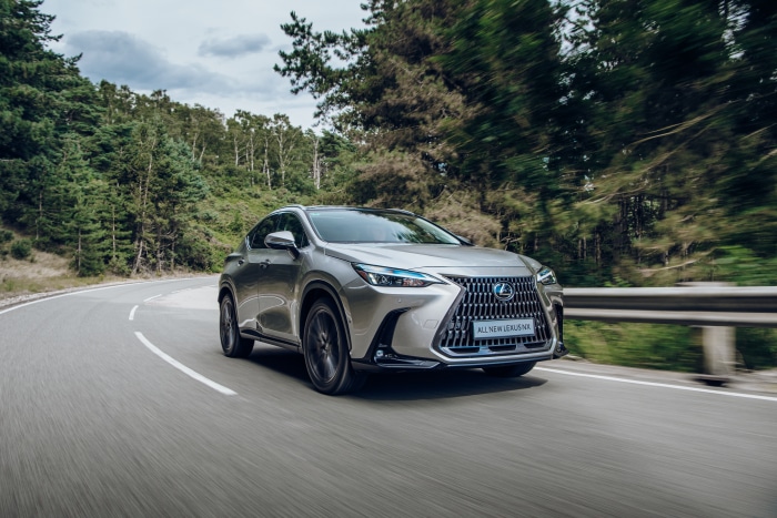 All New Lexus NX driving on a winding road