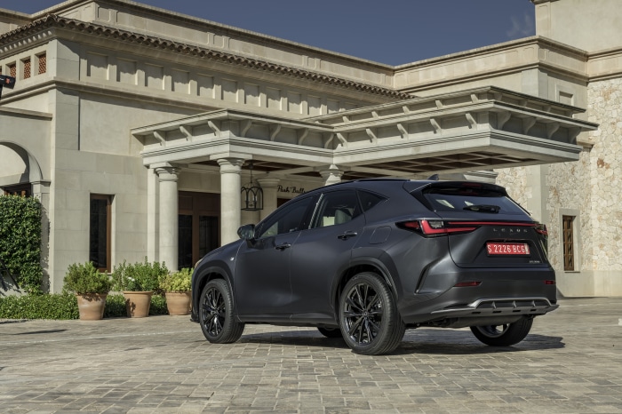 Lexus NX 350 F SPORT parked in front of a building