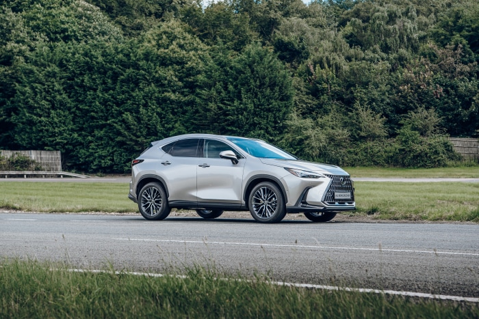 Silver Lexus NX 350 4K parked on asphalt road