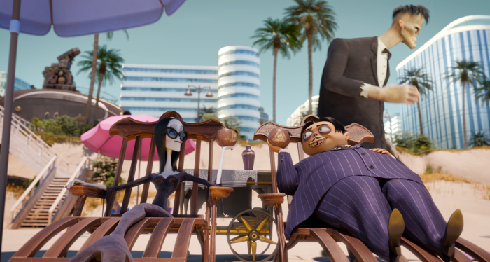 Morticia and Gomez Addams from The Addams Family 2 on beach