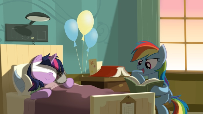 Rainbow Dash reads to Twilight Sparkle in bed