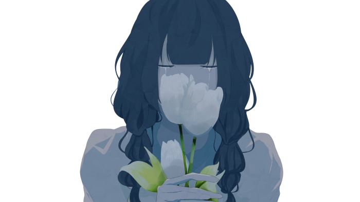 Girl crying holding white tulips