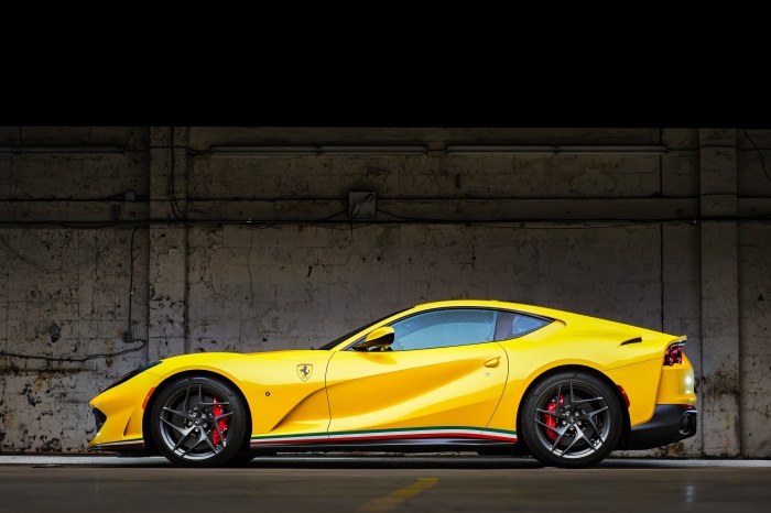 Yellow Ferrari 812 Superfast parked indoors