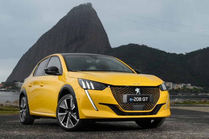Yellow Peugeot e-208 GT electric car in Rio de Janeiro