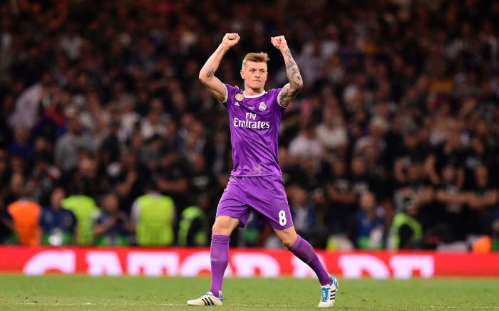 Toni Kroos celebrating on a football pitch