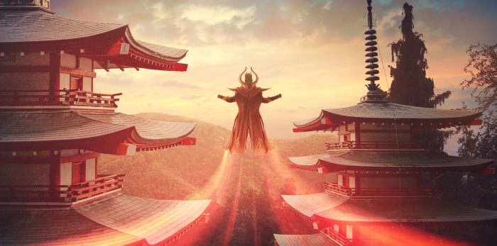 Character flying between Japanese pagodas at sunset